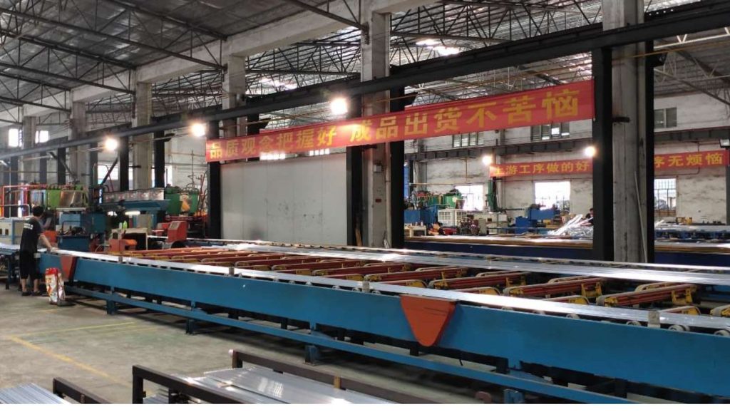 Chinese and Vietnamese tile trim factory workers