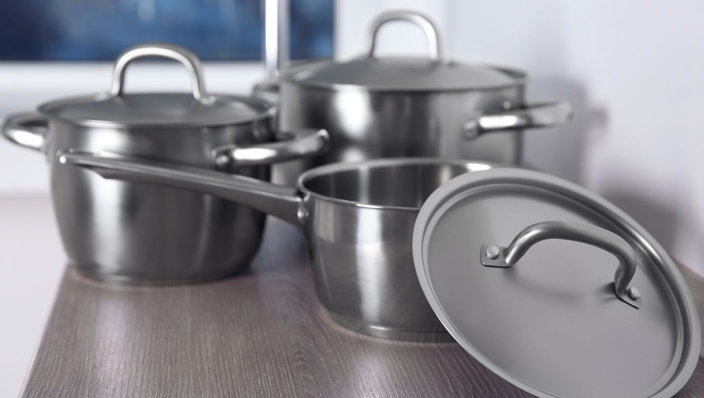 Aluminum Cookware On Table aluminum cookware on table