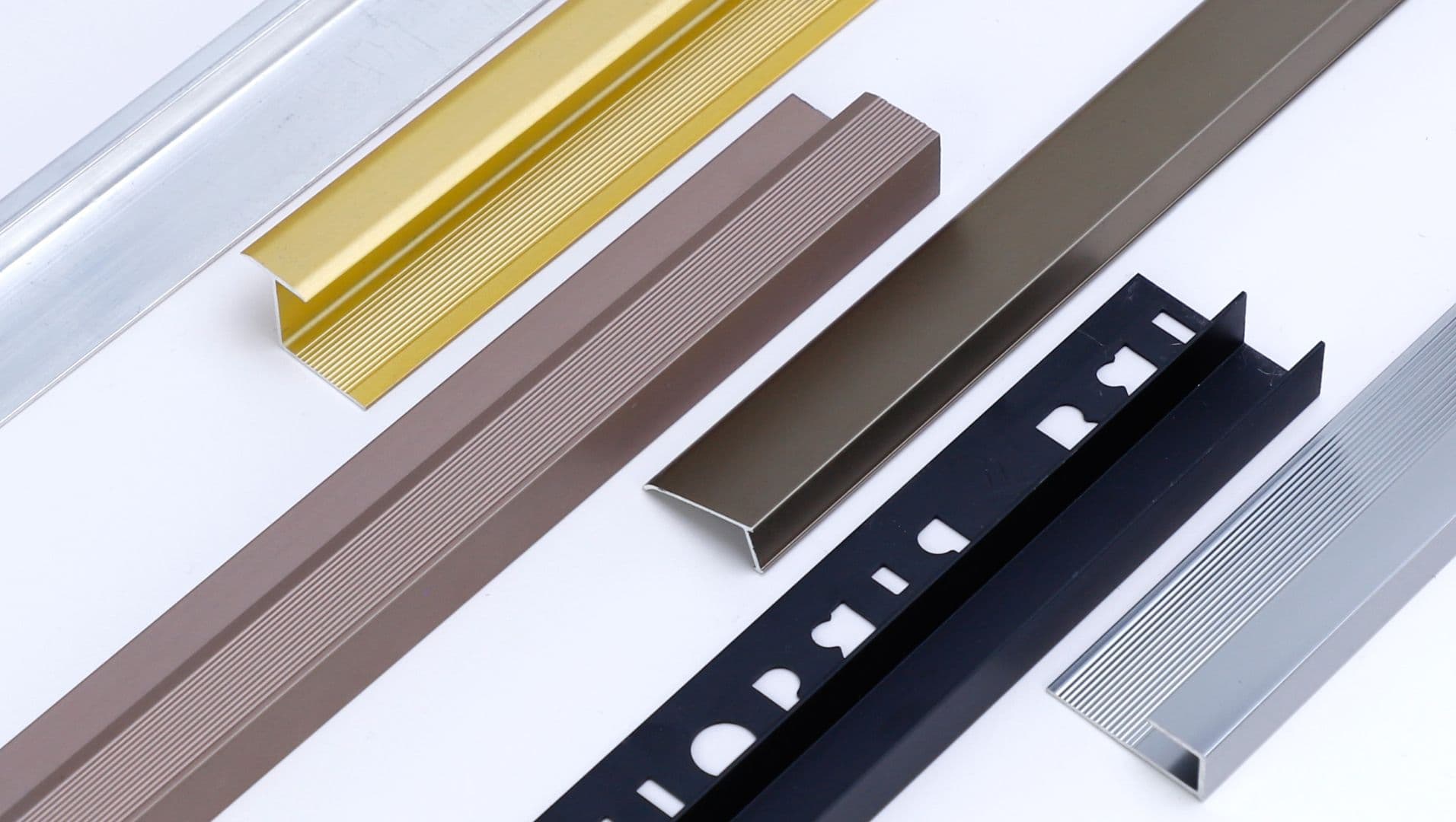 A display of various aluminum tile trims