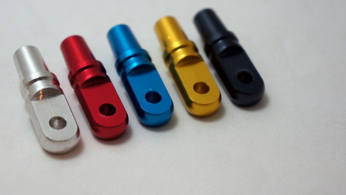 Close-up of an anodized aluminum surface showcasing vibrant colors and textures.