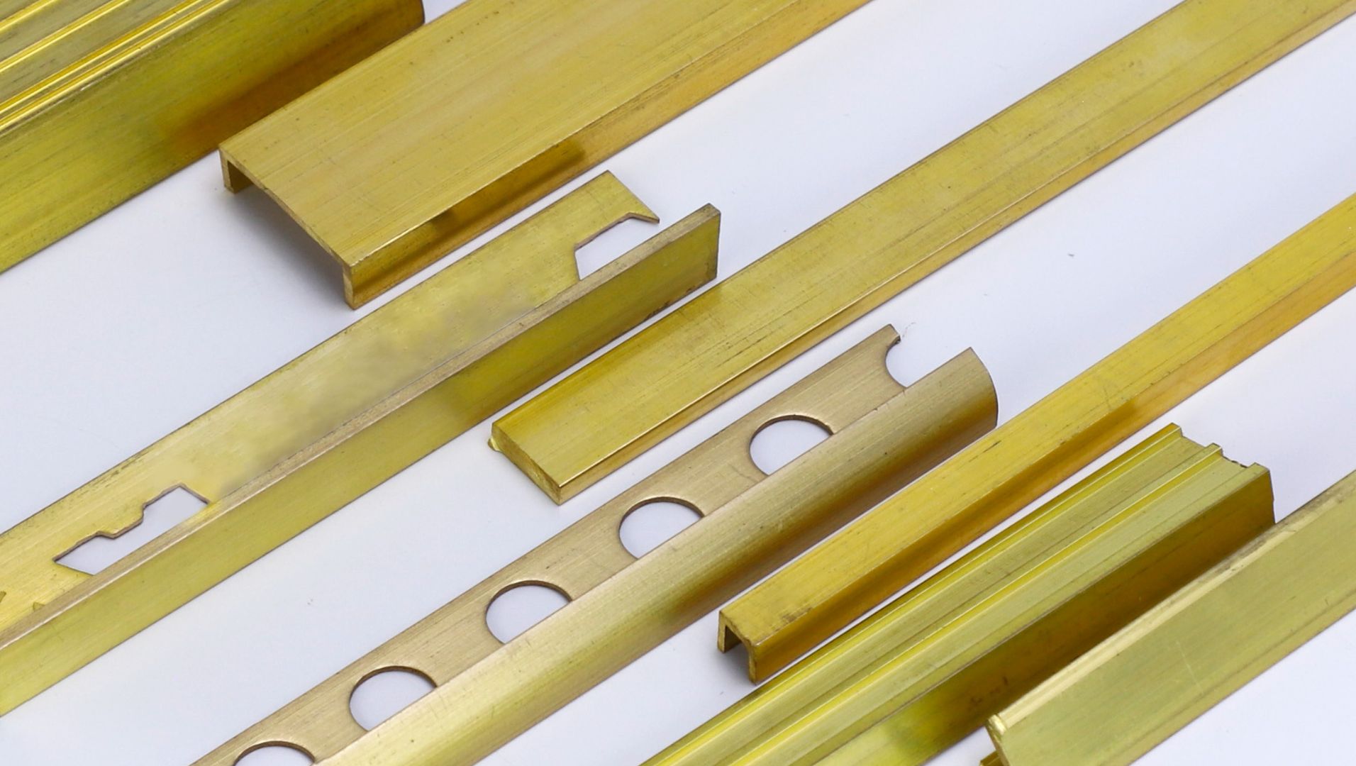 A close-up of Antique Brass Tile Trim