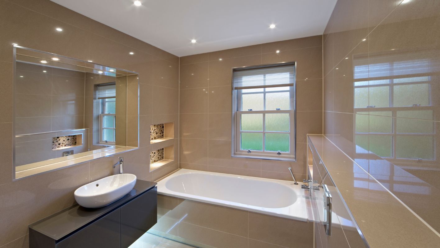 beige tile bathroom with accessories