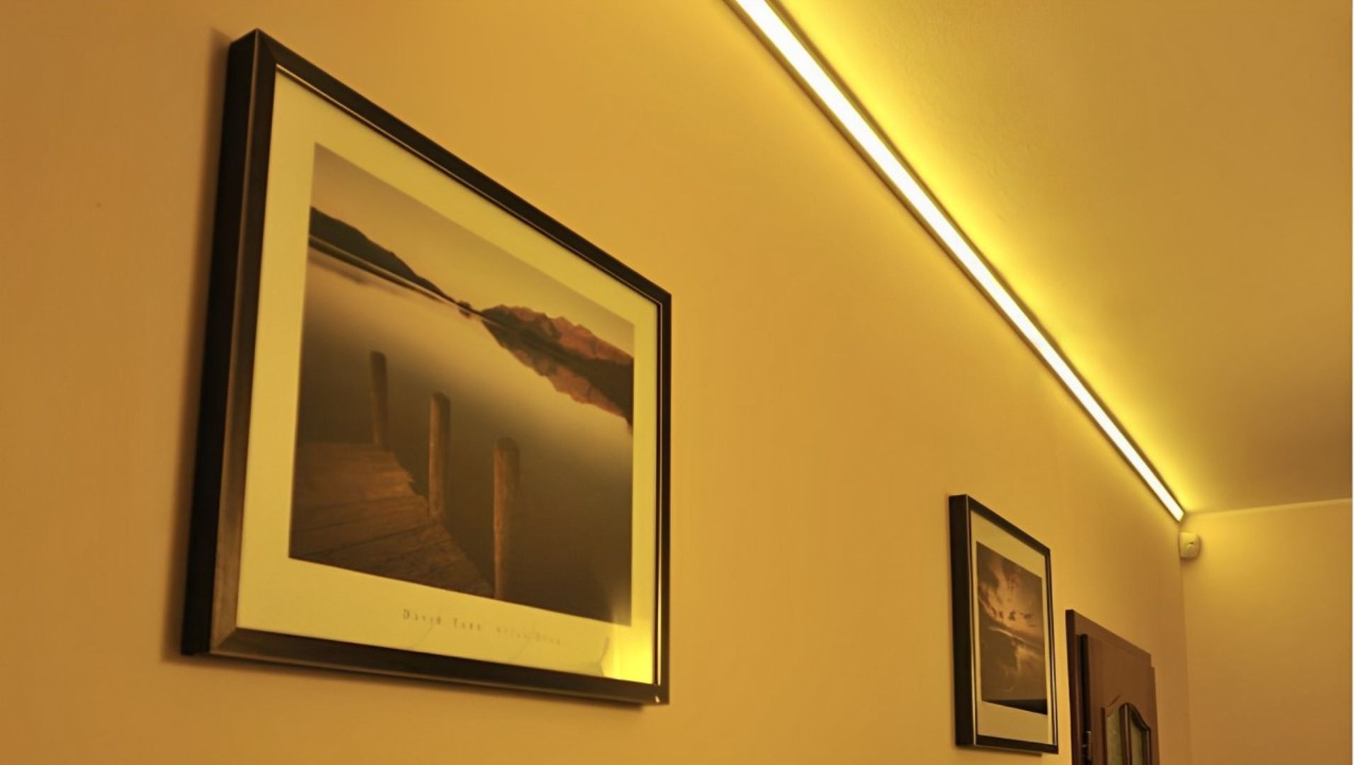 Corner LED profiles used in various interior settings like under cabinets and stairways.