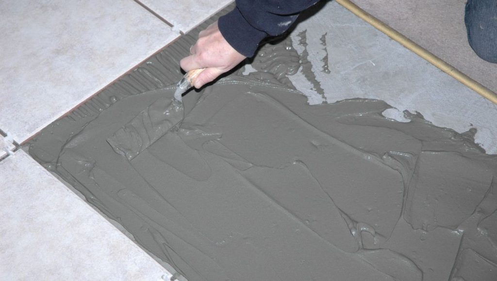 lay tile over linoleum