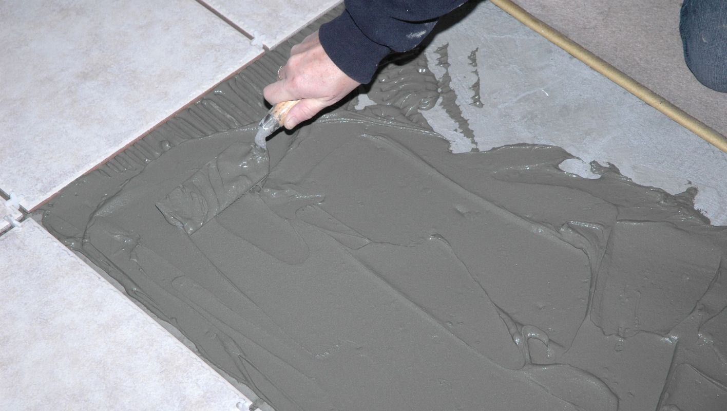 lay tile over linoleum