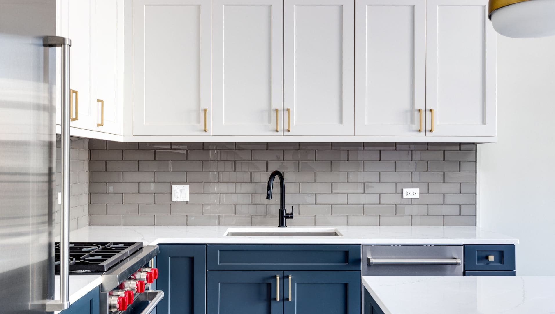 Modern kitchen backsplash with mitered edges and caulking