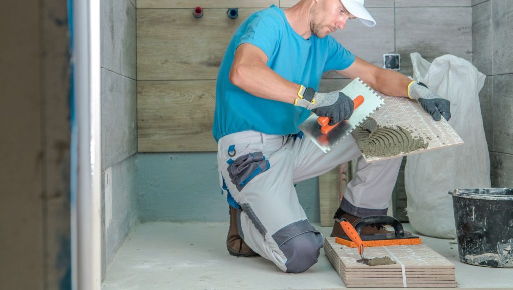 tile the walls or floor first