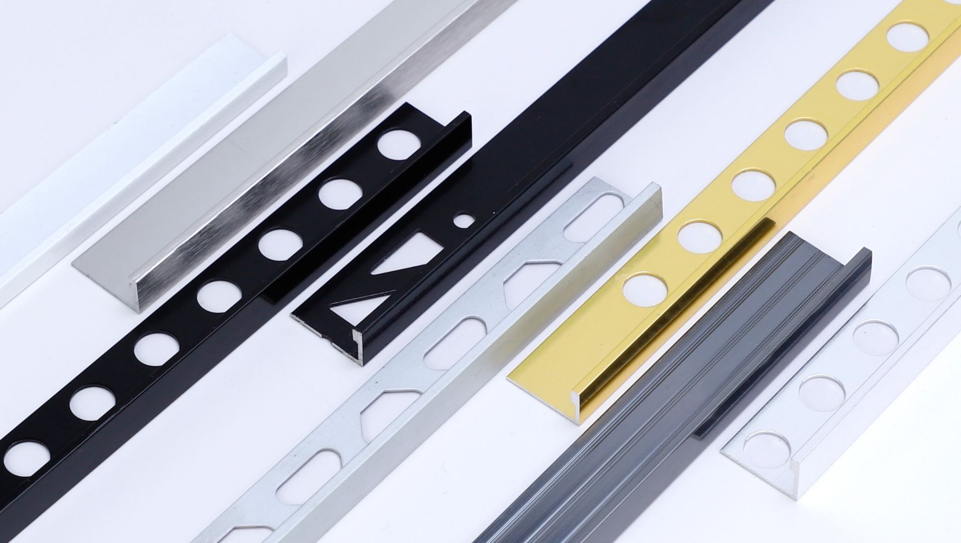 Tile Trim Selection Close-up of tile trims against various tiles